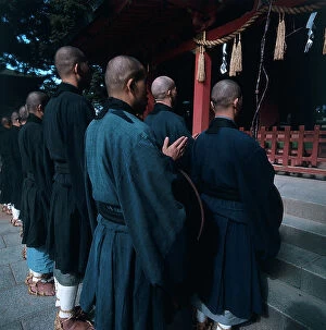 Images Dated 30th October 2009: Kobe. Shofukuji Zen monastery. Monks getting out in the early morning to collect alms in the city
