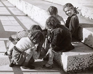 : Some little girls playing in the street