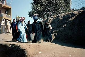 Images Dated 12th October 2011: Luxor in Upper Egypt, women are returning on the ferry, from the market