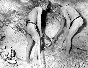 Images Dated 19th September 2007: Two men digging with tools in a sulphur mine. The caption on the photo states