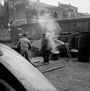Images Dated 26th May 2011: Men working on a Venetian squero