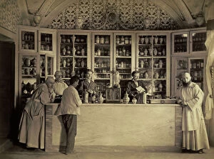 Images Dated 4th February 2011: Three monks, two secular salespeople and a client are posing in the pharmacy of the Certosa del