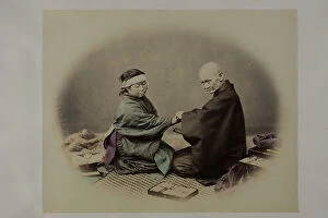Images Dated 24th November 2010: Old japanese doctor and young patient during a visit. They are both in traditional clothes