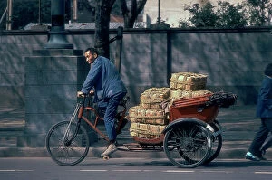 July Collection: 'On the streets', man on a rickshaw, Shanghai 1974