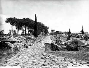Images Dated 24th March 2010: Via Ostiense in Ancient Ostia. In the background, Porta Romana