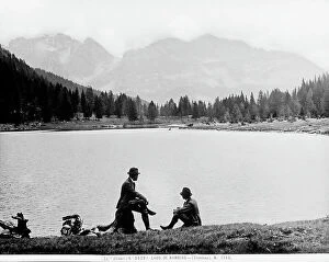 Images Dated 12th March 2010: Panorama of Lake Nambino. Two people are sitting in the foreground observing the panoramic view