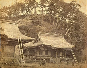 Images Dated 21st November 2011: Partial view of the Hachiman Temple of Kamakura. Seated on the stairs of the temple are