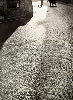 Une rue pavée en pierre de Selciato.