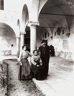 Images Dated 25th February 2008: Three people in a cloister