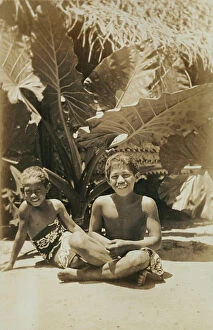 Images Dated 5th April 2011: Portrait of children in the shade of a tropical plant, Tahiti