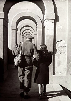 Florence Collection: Portrait of a couple walking on the Lungarno Archibusieri, Florence