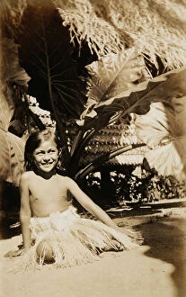 Images Dated 25th November 2011: Portrait of a girl in the shade of a tropical plant, Tahiti