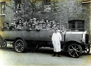 Images Dated 24th April 2012: Portrait of a group of men sitting in a large car. The chauffeur, in uniform