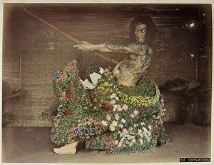 Japan: Portrait of a Japanese man tattooed with dress of chrysanthemums