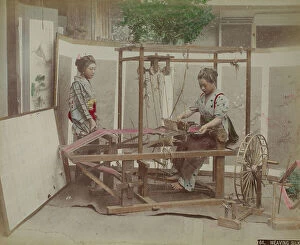 Japan: Portrait of two Japanese silk weavers (women) working at a loom