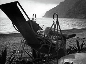 Images Dated 10th October 2011: Portrait of the poet Sandro Penna (1906-1977) on a deckchair by the sea