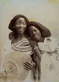 Images Dated 4th April 2011: Portrait of two smiling young women, in traditional dress, from Stone Town on the island of
