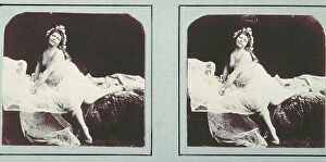 Images Dated 8th November 2011: Portrait of a woman, reclining on a bed, with her body partially covered by long veils