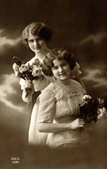 Images Dated 21st October 2011: Portrait of two young girls with roses