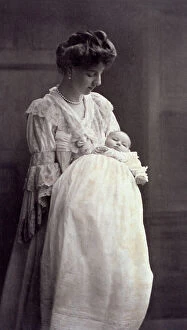 Images Dated 23rd June 2009: Portrait of young mother holding her infant son in her arms. Both are in cerimonial attire