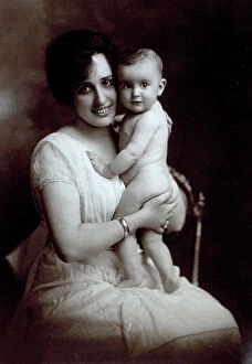 Images Dated 23rd June 2009: Portrait of young mother holding her nude baby daughter