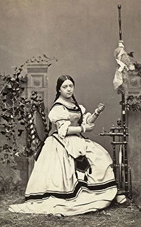 Images Dated 4th May 2011: Portrait of a young woman spinning