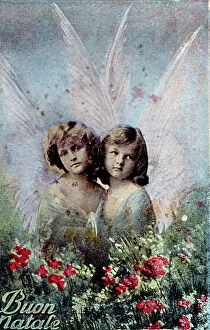 Images Dated 22nd September 2008: Post card with Christmas greetings with two little girls as angels with long feathered wings