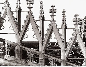 Images Dated 28th February 2008: Detail of a rampant arch of the Cathedral of Milan. The panorama of the town is visible through