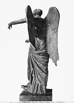 Images Dated 27th December 2012: Rear view of a bronze statue of Winged Victory, held in the Archeological Museum of Brescia
