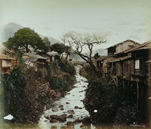 Images Dated 7th July 2011: River landscape in the area of Nagasaki. On the river bank, typical homes of the area