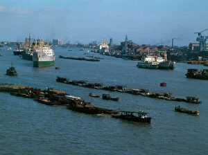 Images Dated 23rd April 2012: Shanghai. In the harbor, junks, barges, modern ships