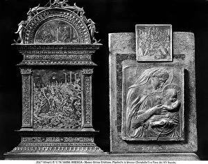 Images Dated 27th December 2012: A slab and a tile in bronze. Sculpted works kept in the Museo Cristiano in Brescia