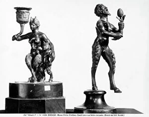 Images Dated 27th December 2012: Two small bronzes in the shape of satyrs, one of which is a candle holder