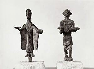 Images Dated 15th February 2008: Small Nuragic bronzes depicting a man and a woman, in the G.A. Sanna National Museum in Sassari