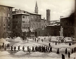 Florence Collection: Snow shovellers in Piazza della Signoria in Florence after an exceptional snowfall