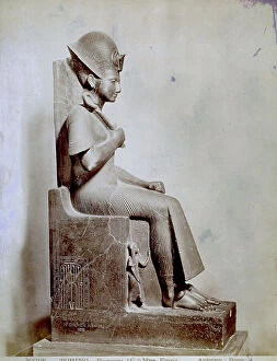Images Dated 28th November 2011: Statue of the pharaoh Ramses II seated on a throne. The statue comes from Thebes