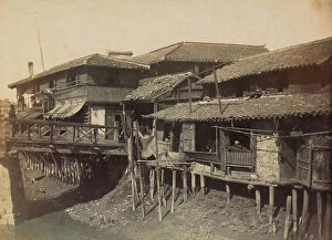 Japan: Stilt houses on the banks of a river in Japan