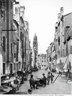 Images Dated 11th March 2010: Street in Chioggia with women embroidering
