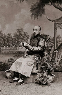 Images Dated 18th November 2011: Studio portrait of a young Japanese man wearing traditional clothes