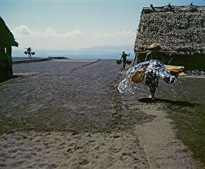 Images Dated 7th September 2011: Sunda Islands. Island of Bali. Sow of seawater on the beach for the extraction of salt