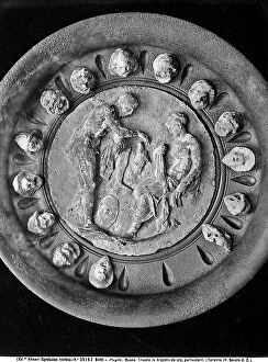 Images Dated 6th April 2012: Terracotta plate with makes on the external edges and a mythological scene in the center