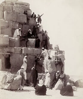 Images Dated 6th October 2006: Tourists climbing a pyramid