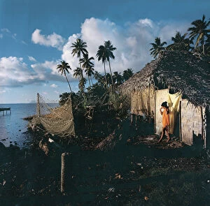 Images Dated 13th June 2008: One of the last traditional Polynesian huts on the shores of Raiatea Island
