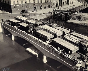 Images Dated 24th March 2011: A few trucks with trailers test the resistance of a bridge in Livorno