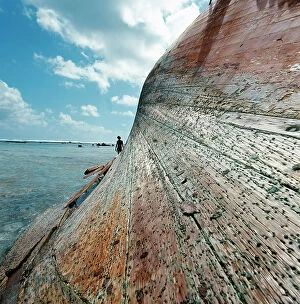 Images Dated 18th January 2012: Tuamotu Islands. Rangiroa. Wreck of the brigantine sailboat 'Wanderer', on the coral reef