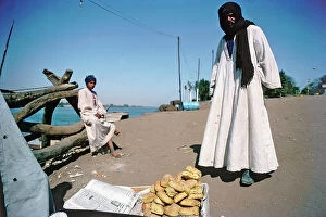 Images Dated 12th October 2011: Upper Egypt, Luxor, street vendors to the ferry that transports to the ancient Thebes
