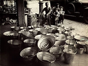Images Dated 4th August 2010: Vendors of buckets at the general markets of Turin
