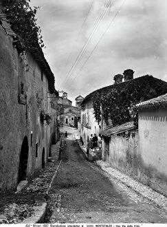 Images Dated 3rd April 2012: View with people of a city street in Montefalco, Perugia