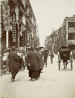 Images Dated 17th November 2011: View of a small Chinese town street with people