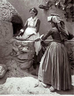 Images Dated 29th July 2009: Vittorio Alinari's second journey: two Tratalias women in front of the oven